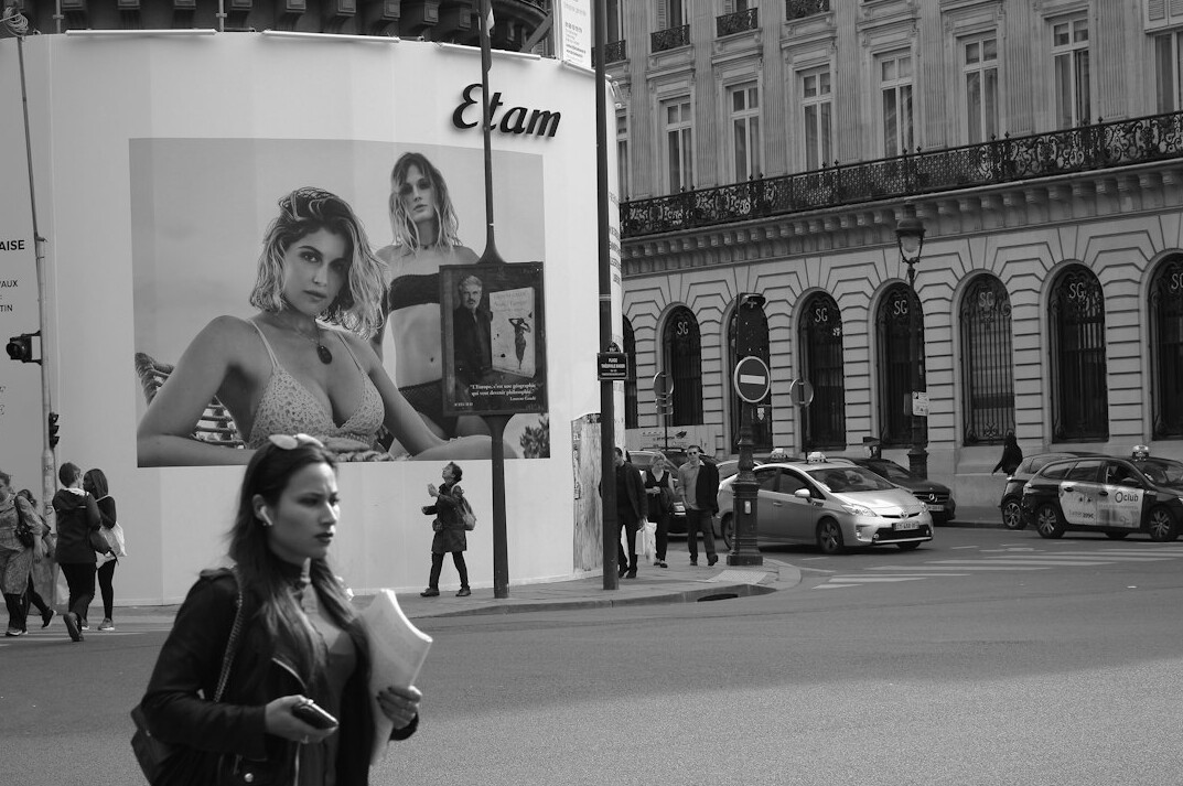 celebrity walking in paris street